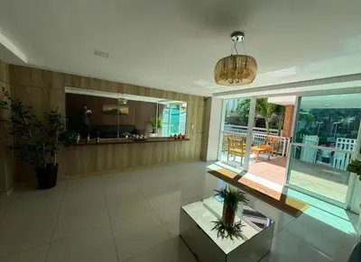 A piscina em ou perto de Apartamento a dois passos da beira mar