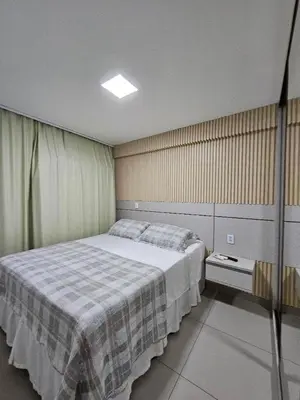 Uma cama ou camas num quarto em KQ 64 - Beira-Mar com Estilo Apê 2 Quartos Aconchegante em Fortaleza