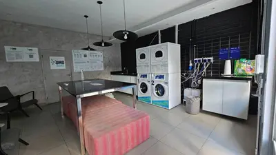 A cozinha ou kitchenette de KQ 64 - Beira-Mar com Estilo Apê 2 Quartos Aconchegante em Fortaleza