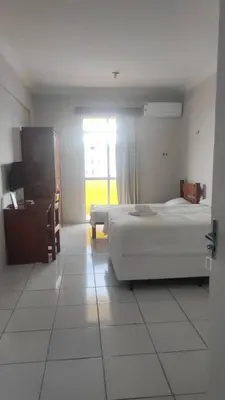 Uma cama ou camas num quarto em Hotel e Flat Sobral Mundi