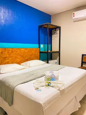 Uma cama ou camas num quarto em Pousada Vila Mansa Jeri