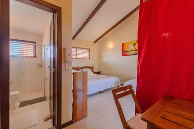 Uma cama ou camas num quarto em Casa Vento - Seu Refúgio Exclusivo por Carpediem