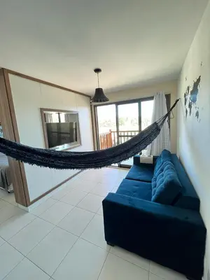 Uma área de estar em Vg sun cumbuco 2 by Ceará Flats