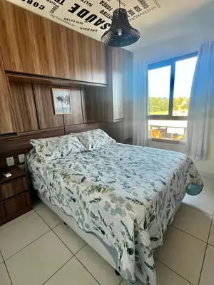 Uma cama ou camas num quarto em Vg sun cumbuco 2 by Ceará Flats