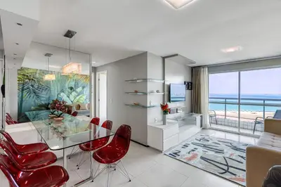 Uma área de estar em Apartamento Vista Mar