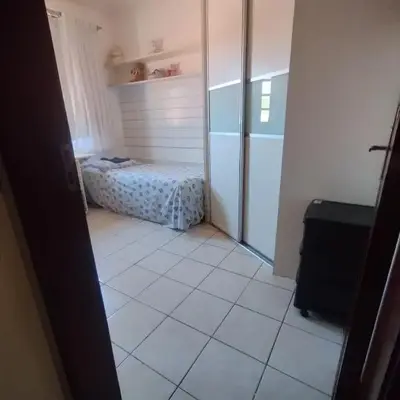Quarto em casa de Família