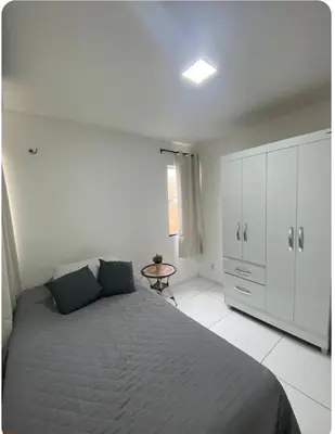 Uma cama ou camas num quarto em Cn Porto das Dunas