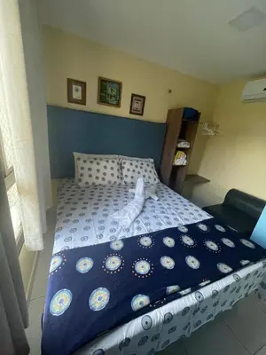 Uma cama ou camas num quarto em Vg Sun Cumbuco, na praia lindo C1 301