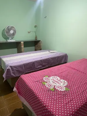 Uma cama ou camas num quarto em Casa de praia Porto Das Dunas