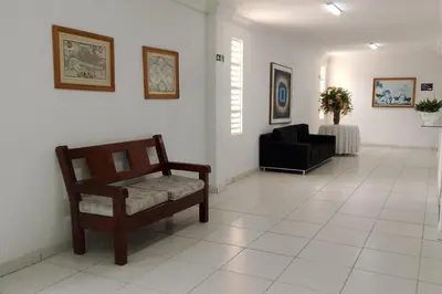 Uma área de estar em Hotel Dom Cláudio