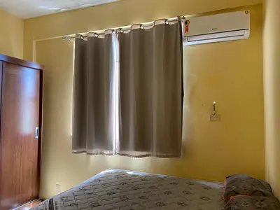 Uma cama ou camas num quarto em Apartamento completo