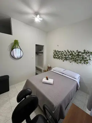Uma cama ou camas num quarto em Suite em apartamento compartilhado em Meireles, Fortaleza