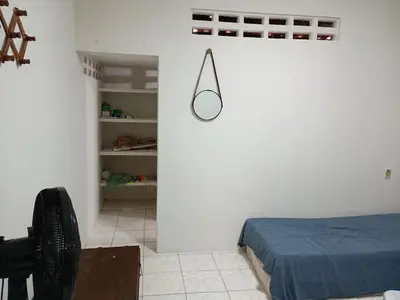 Uma cama ou camas num quarto em Casa Bem-ti-vi
