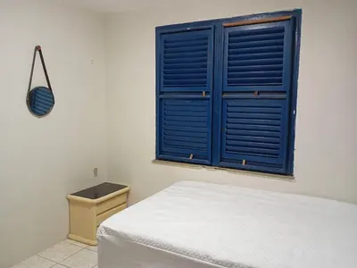 Uma cama ou camas num quarto em Casa Bem-ti-vi