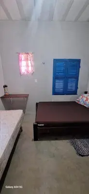 Uma cama ou camas num quarto em Casa Mosaico