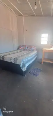 Uma cama ou camas num quarto em Casa Mosaico
