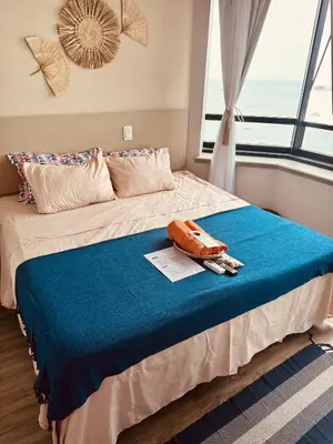 Uma cama ou camas num quarto em DMCeara Golden Fortaleza - Sertão