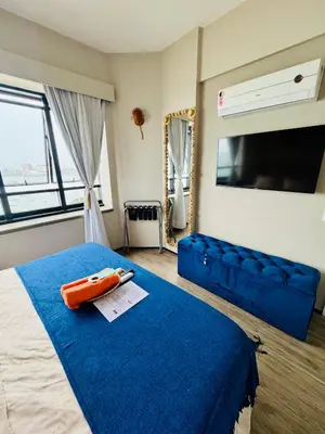 Uma cama ou camas num quarto em DMCeara Golden Fortaleza - Sertão