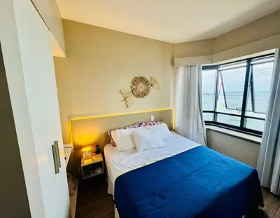 Uma cama ou camas num quarto em DMCeara Golden Fortaleza