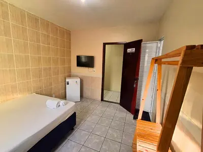 Uma cama ou camas num quarto em Pousada Dom Manuel - Ce