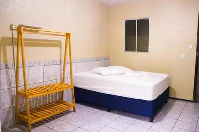 Uma cama ou camas num quarto em Pousada Dom Manuel - Ce