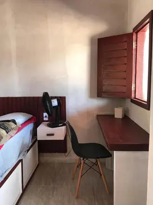 Uma cama ou camas num quarto em Casa dos Anjos