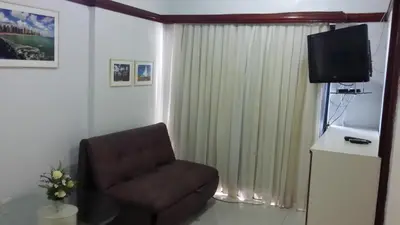 Uma televisão e/ou sistema de entretenimento em Villa Costeira Beira Mar