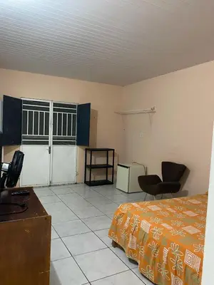 Uma cama ou camas num quarto em Kit net Baturité