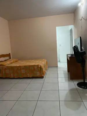 Uma cama ou camas num quarto em Kit net Baturité