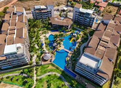 A piscina em ou perto de Raridade do Beach Park Living Pé na areia e vista mar
