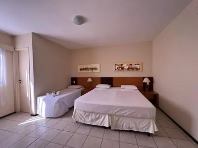 Uma cama ou camas num quarto em Aquaville Resort Piscinas Praia 2