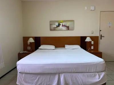 Uma cama ou camas num quarto em Paraíso no Aquaville Resort 1