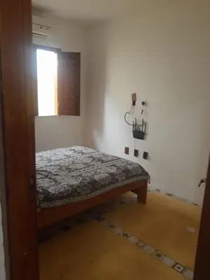 Uma cama ou camas num quarto em Casa frente ao mar em Icapuí