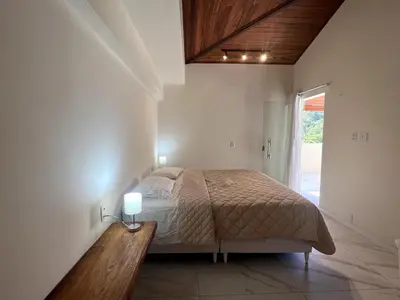 Uma cama ou camas num quarto em Cobertura de luxo de 3 a 4 quartos, 4 a 5 banos, ate 7 p