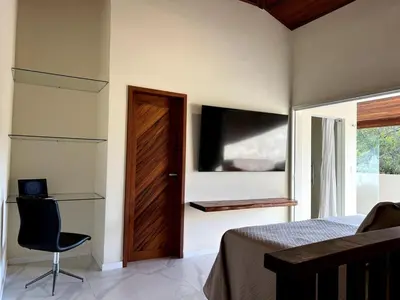 Uma televisão e/ou sistema de entretenimento em Cobertura de luxo de 3 a 4 quartos, 4 a 5 banos, ate 7 p