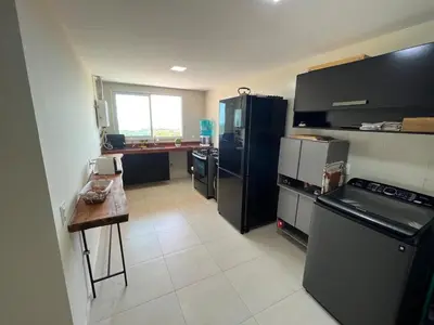 A cozinha ou kitchenette de Cobertura Maravilhosa no Porto Das Dunas