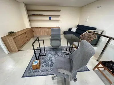 Uma área de estar em Cobertura Maravilhosa no Porto Das Dunas