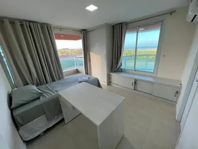 Uma cama ou camas num quarto em Cobertura Maravilhosa no Porto Das Dunas
