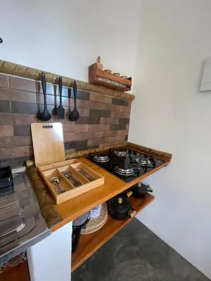 A cozinha ou kitchenette de Aquarela Lofts em Icaraizinho