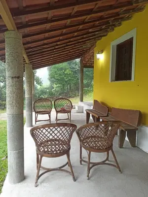 Uma área de estar em Chácara da Lilian