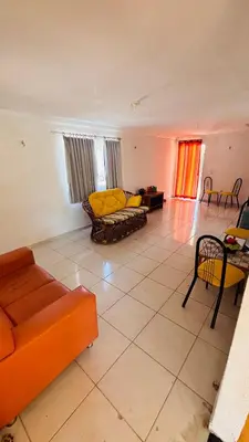 Uma área de estar em Duplex com Piscina a 7 KM do Beach Park