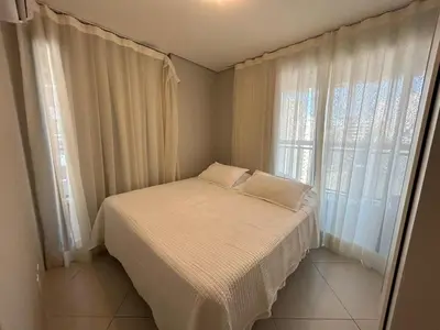 Uma cama ou camas num quarto em 1507 - Apto p até 5, perto da praia c estacionamento - Landscape