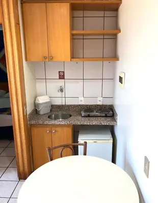 A cozinha ou kitchenette de Hotel Flat Classic