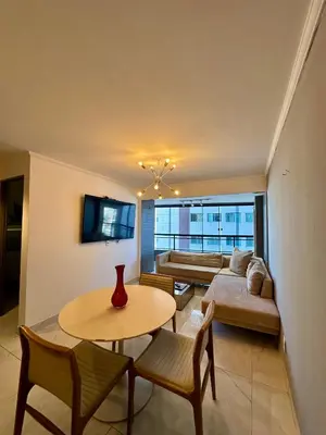 Uma televisão e/ou sistema de entretenimento em 504 Ocean Tower Vista mar