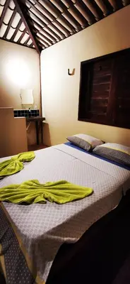 Uma cama ou camas num quarto em Casa 3 quartos pousada VIDABOA