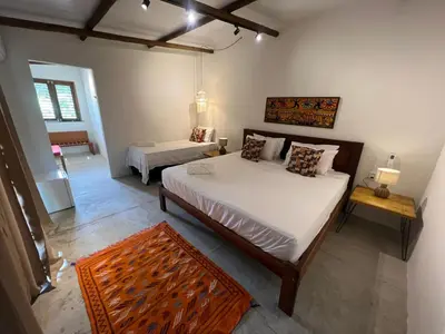 Uma cama ou camas num quarto em Villa Albergaria Icaraizinho