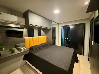 Uma cama ou camas num quarto em Praia do Futuro Fortaleza