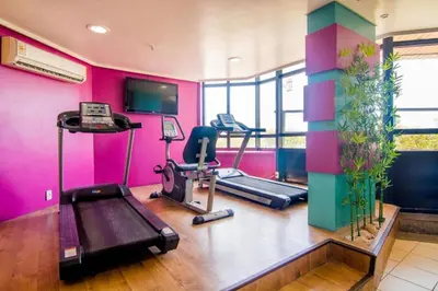 O centro de fitness e/ou as comodidades de fitness de Suíte Deslumbrante Frente Mar - Golden Fortaleza-16512