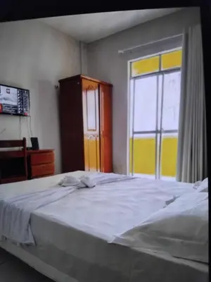 Uma cama ou camas num quarto em Hotel e Flat Sobral Mundi