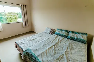 Uma cama ou camas num quarto em Casa em barra nova